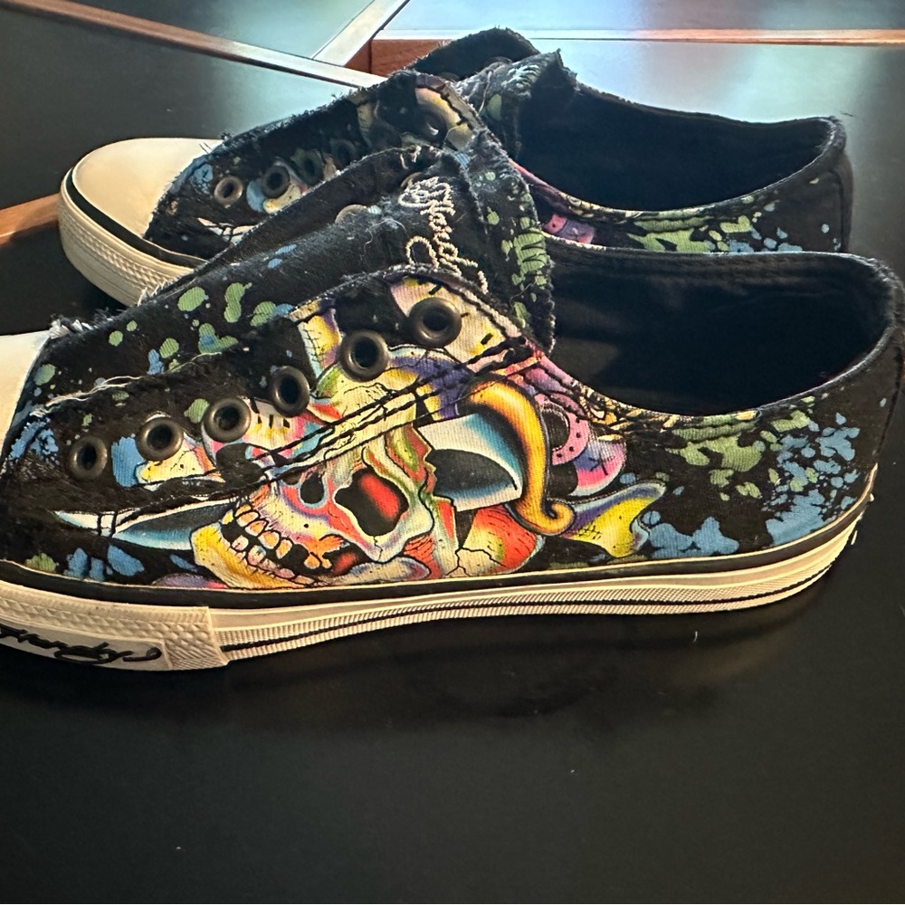Ed Hardy slip-on tennis shoes. Very good condition.